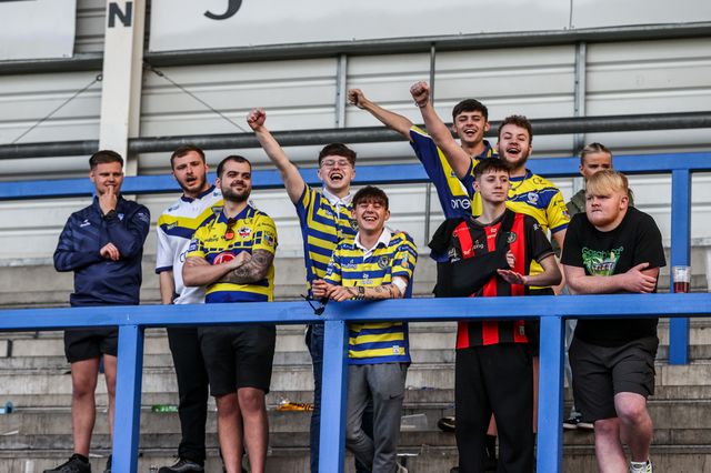 Warrington Wolves fans celebrate the win during the Betfred Super League round 5 match Warrington Wolves vs Castleford Tigers at The Halliwell Jones Stadium, Warrington, United Kingdom on 21 March 2026

(Photo by Alfie Cosgrove/News Images)