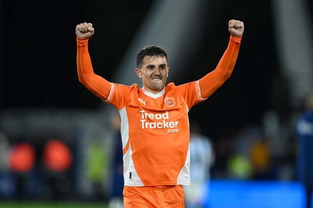 Albie Morgan of Blackpool celebrates with the fans at the end of the Sky Bet League 1 match Huddersfield Town vs Blackpool at John Smith's Stadium, Huddersfield, United Kingdom, 24th September 2024

(Photo by Craig Thomas/News Images)