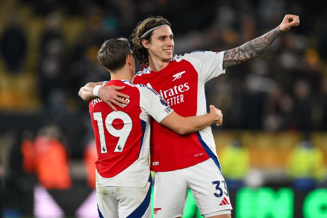 Riccardo Calafiori of Arsenal and Leandro Trossard of Arsenal celebrates his sides victory at the end of the Premier League match Wolverhampton Wanderers vs Arsenal at Molineux, Wolverhampton, United Kingdom, 25th January 2025

(Photo by Craig Thomas/News Images)