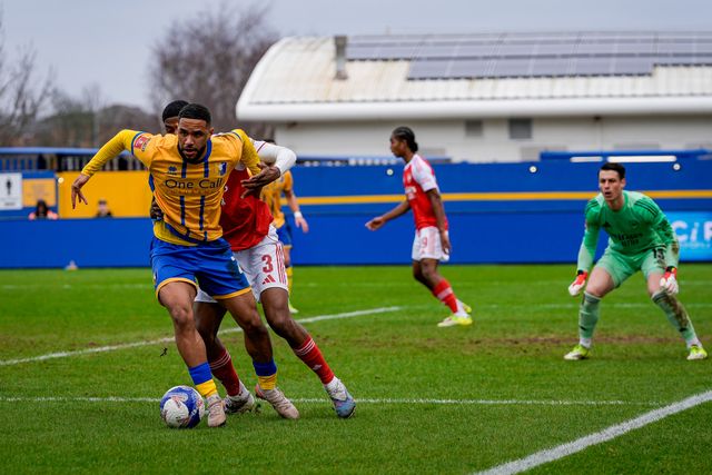 Tyler Roberts of Mansfield Town battles for the ball  with Cristhian Mosquera of Arsenal during the Emirates FA Cup fifth round match Mansfield Town vs Arsenal at One Call Stadium, Mansfield, United Kingdom on 07 March 2026

(Photo by Maynard Manyowa/News Images)