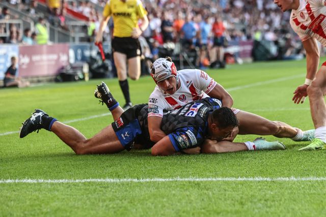 Ryan Hall of Leeds Rhinos is tackled by Harry Robertson of St. Helens just before the try line during the Betfred Super League round 15 match St Helens vs Leeds Rhinos at Totally Wicked Stadium, St Helens, United Kingdom, 20th June 2025

(Photo by Alfie Cosgrove/News Images)