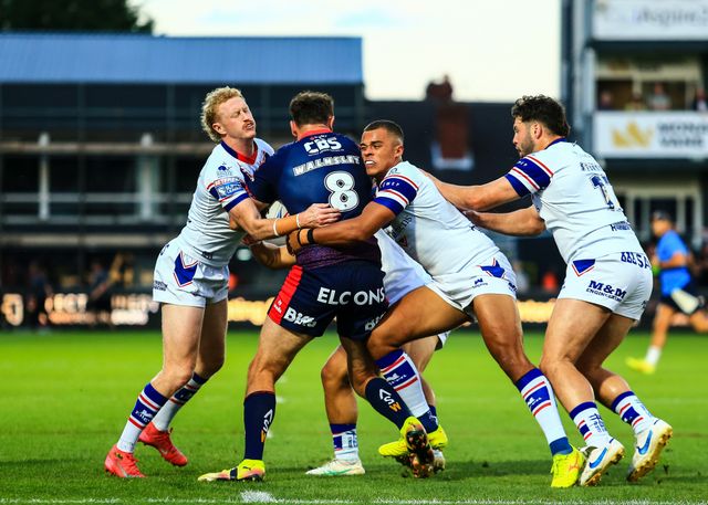 Alex Walmsley of St. Helens is tackled during the Betfred Super League round 21 match Wakefield Trinity vs St Helens at DIY Kitchens Stadium, Wakefield, United Kingdom, 8th August 2025

(Photo by Richard Bierton/News Images)