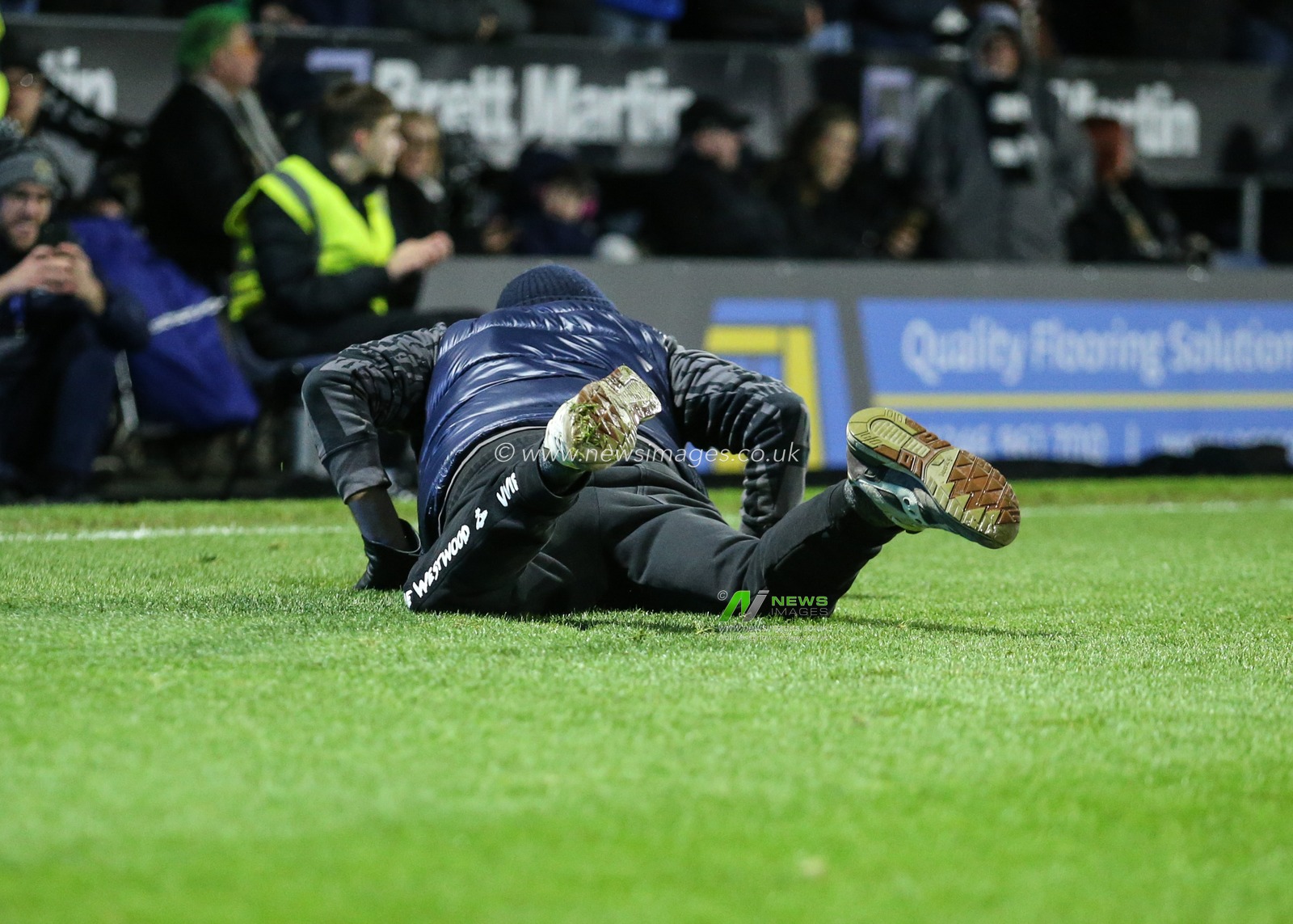 Chesterfield fan invades the pitch  to celebrate Chesterfield  taking the lead during the Sky Bet League 2 match Chesterfield vs Notts County at SMH Group Stadium, Chesterfield, United Kingdom, 26th December 2025

(Photo by Richard Bierton/News Images)

*** GER AUT SUI OUT ***