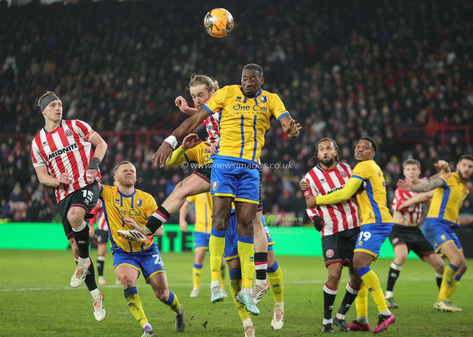 Lucas Akins of Mansfield Town heads the ball clear during the Emirates FA Cup Third Round match Sheffield United vs Mansfield Town at Bramall Lane, Sheffield, United Kingdom, 11th January 2026

(Photo by Richard Bierton/News Images)