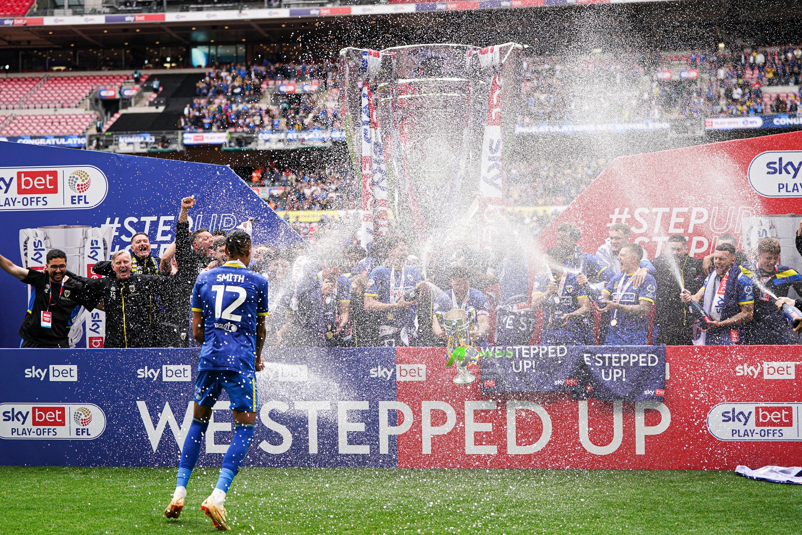 Wimbledon players celebrate win after the Sky Bet League 2 Playoff Final match AFC Wimbledon vs Walsall at Wembley Stadium, London, United Kingdom, 26th May 2025

(Photo by Harvey Murphy/News Images)