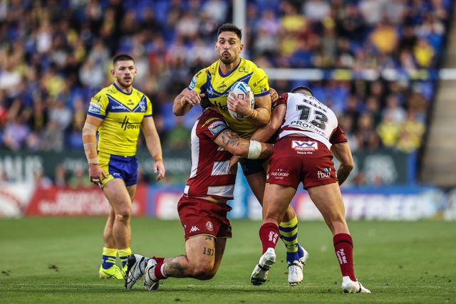 Ryan Matterson of Warrington Wolves is tackled during the Betfred Super League round 21 match Warrington Wolves vs Wigan Warriors at Halliwell Jones Stadium, Warrington, United Kingdom, 8th August 2025

(Photo by Alfie Cosgrove/News Images)