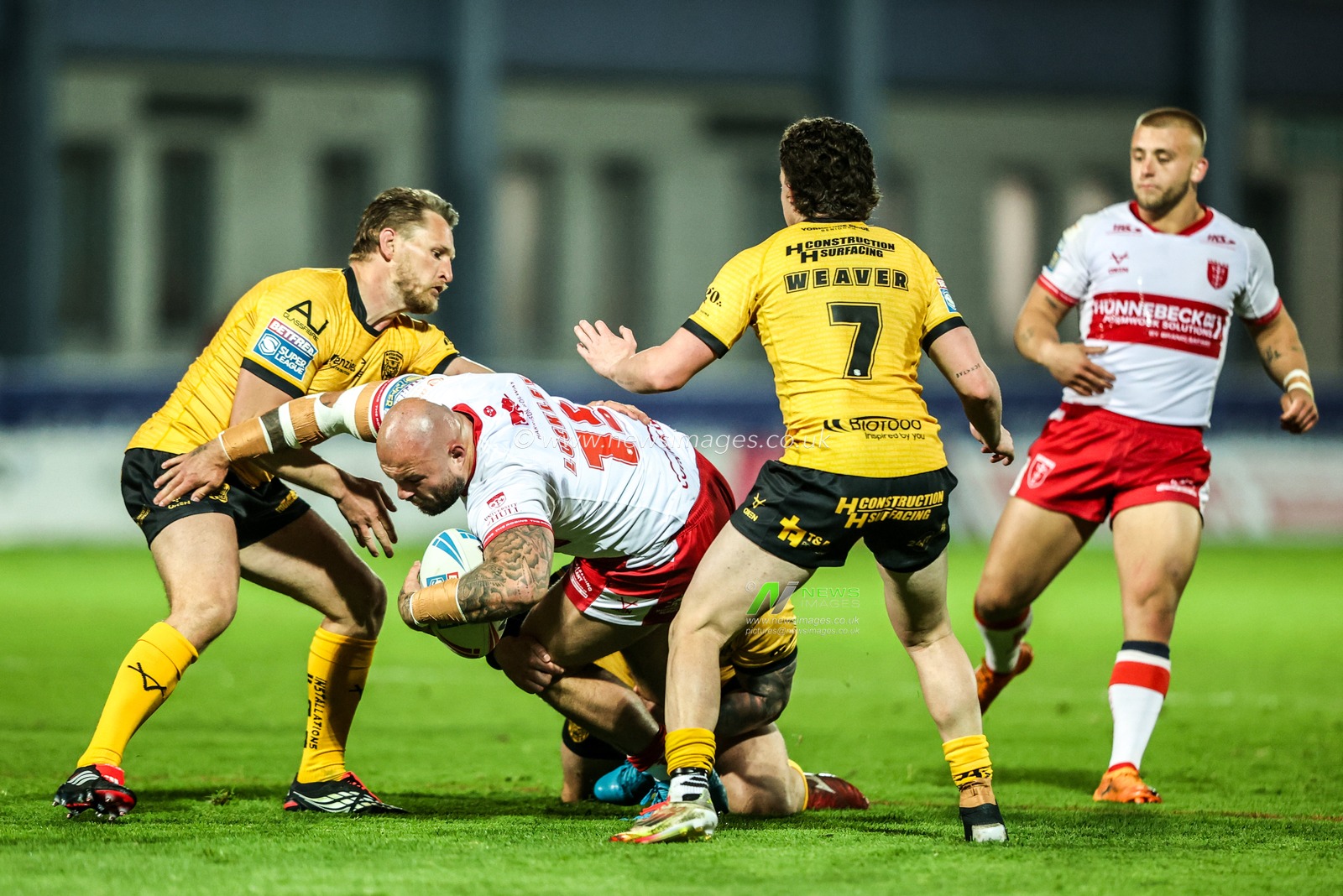Sam Luckley of Hull KR is tackled by Jordan Lane of Castleford Tigers during the Betfred Super League round 10 match Hull KR vs Castleford Tigers at Sewell Group Craven Park, Hull, United Kingdom on 30 April 2026

(Photo by Alfie Cosgrove/News Images)