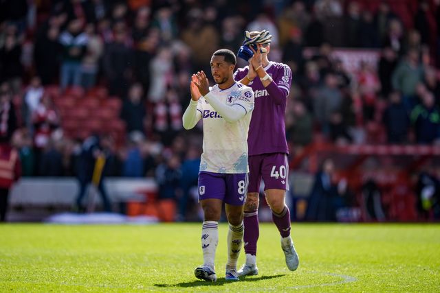 Youri Tielemans of Aston Villa and Aston Villa goalkeeper Marco Bizot applauds the fans after the final whistle  during the Premier League match Nottingham Forest vs Aston Villa at City Ground, Nottingham, United Kingdom on 12 April 2026

(Photo by Maynard Manyowa/News Images)