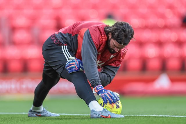 Alisson Becker of Liverpool 
in the pregame warmup session during the Premier League match Liverpool vs Wolverhampton Wanderers at Anfield, Liverpool, United Kingdom, 27th December 2025

(Photo by Mark Cosgrove/News Images)

*** GER AUT SUI OUT ***