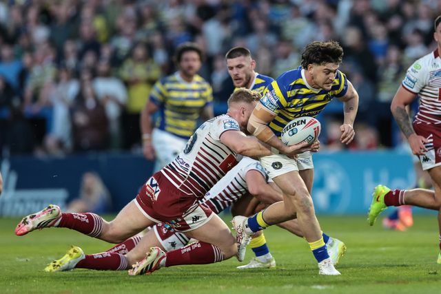 Jordan Crowther of Warrington Wolves is tackled during the Betfred Super League round 9 match Warrington Wolves vs Wigan Warriors at The Halliwell Jones Stadium, Warrington, United Kingdom on 24 April 2026

(Photo by Mark Cosgrove/News Images)