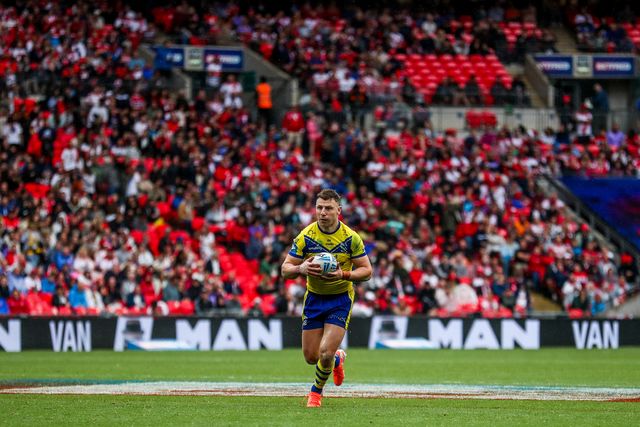 George Williams of Warrington Wolves runs with the ball during the Betfred Challenge Cup Final Warrington Wolves vs Hull KR at Wembley Stadium, London, United Kingdom, 7th June 2025

(Photo by Izzy Poles/News Images)