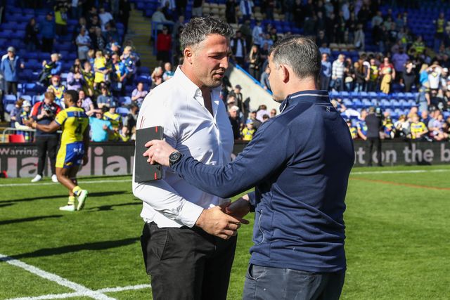 Sam Burgess Head Coach of Warrington Wolves and Paul Wellens Head Coach of St. Helens in conversation after the Betfred Challenge Cup Quarter Final match Warrington Wolves vs St Helens at Halliwell Jones Stadium, Warrington, United Kingdom, 5th April 2025

(Photo by Gareth Evans/News Images)