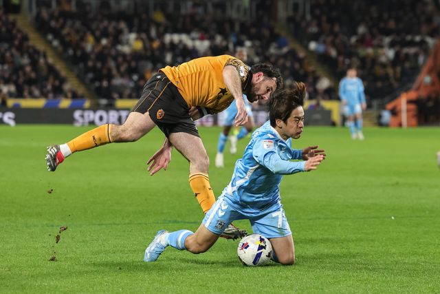 Tatsuhiro Sakamoto of Coventry City is fouled by Lewis Coyle of Hull City during the Sky Bet Championship match Hull City vs Coventry City at MKM Stadium, Hull, United Kingdom on 06 April 2026

(Photo by Mark Cosgrove/News Images)