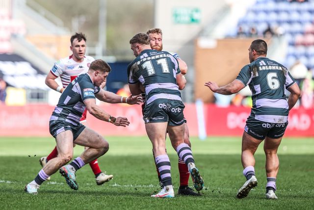 Luke Thompson of Wigan Warriors is tackled by Asher O'Donnell of Huddersfield Giants during the Betfred Super League round 6 match Wigan Warriors vs Huddersfield Giants at The Brick Community Stadium, Wigan, United Kingdom on 28 March 2026

(Photo by Alfie Cosgrove/News Images)