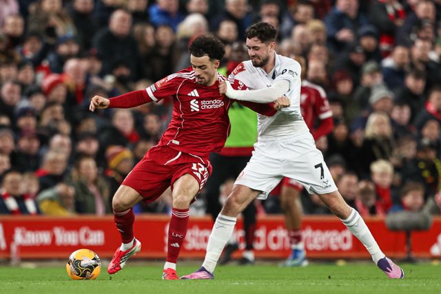 Curtis Jones of Liverpool battle for the ball with Caylan Vickers of Barnsley during the Emirates FA Cup Third Round match Liverpool vs Barnsley at Anfield, Liverpool, United Kingdom, 12th January 2026

(Photo by Alfie Cosgrove/News Images)