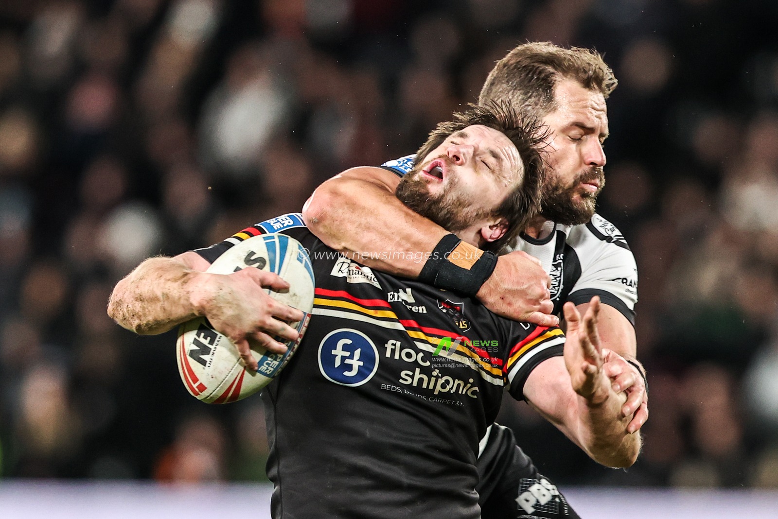 Joe Mellor of Bradford Bulls is tackled by the neck by Aidan Sezer of Hull FC during the Betfred Super League round 1 match Hull FC vs Bradford Bulls at MKM Stadium, Hull, United Kingdom on 14 February 2026

(Photo by Alfie Cosgrove/News Images)