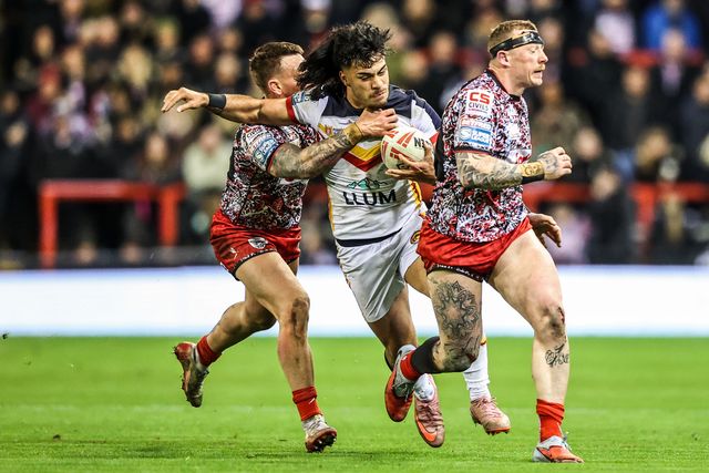 Solomona Faataape of Catalans Dragons is tackled by Keanan Brand of Leigh Leopards during the Betfred Super League match Leigh Leopards vs Catalans Dragons at Leigh Sports Village, Leigh, United Kingdom on 06 March 2026

(Photo by Alfie Cosgrove/News Images)