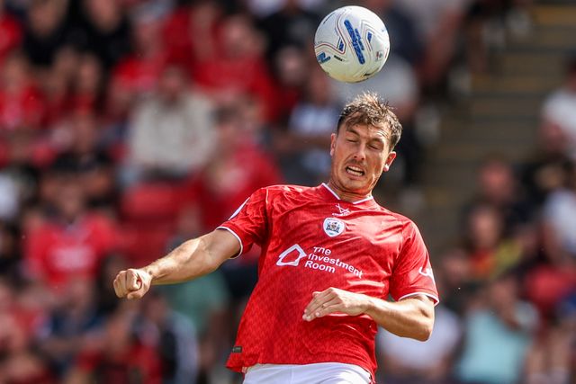 Josh Earl of Barnsley jumps up to win the high ball during the Sky Bet League One match Barnsley vs Bromley at Oakwell, Barnsley, United Kingdom on 15 August 2026

(Photo by Alfie Cosgrove/News Images)