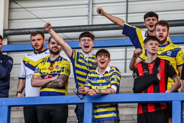 Warrington Wolves fans celebrate the win during the Betfred Super League round 5 match Warrington Wolves vs Castleford Tigers at The Halliwell Jones Stadium, Warrington, United Kingdom on 21 March 2026

(Photo by Alfie Cosgrove/News Images)