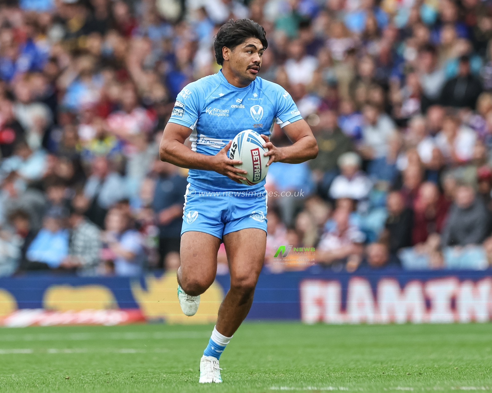 James Bell of St. Helens breaks with the ball during the Magic Weekend match Wigan Warriors vs St Helens at Elland Road, Leeds, United Kingdom, 17th August 2024

(Photo by Mark Cosgrove/News Images)