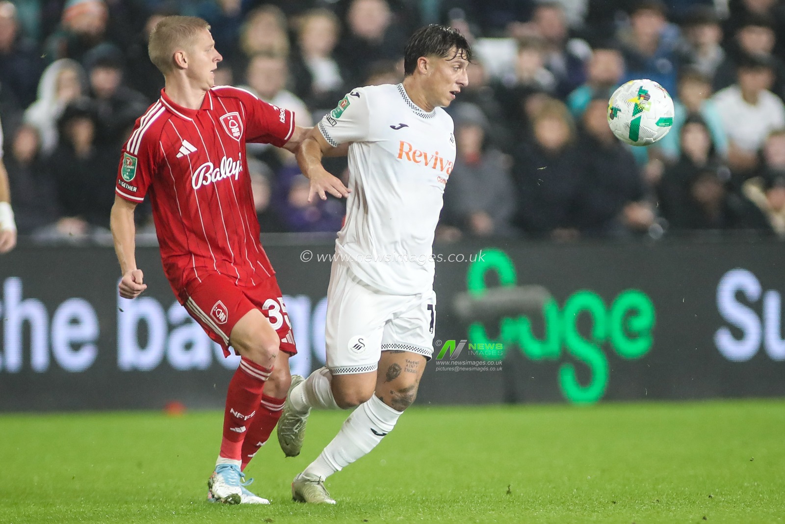 Oleksandr Zinchenko of Nottingham Forest and Gonçalo Franco of Swansea City dual for the ball during the Carabao Cup 3rd Round Swansea City vs Nottingham Forest at Swansea.com Stadium, Swansea, United Kingdom, 17th September 2025

(Photo by Andrew Lewis/News Images)