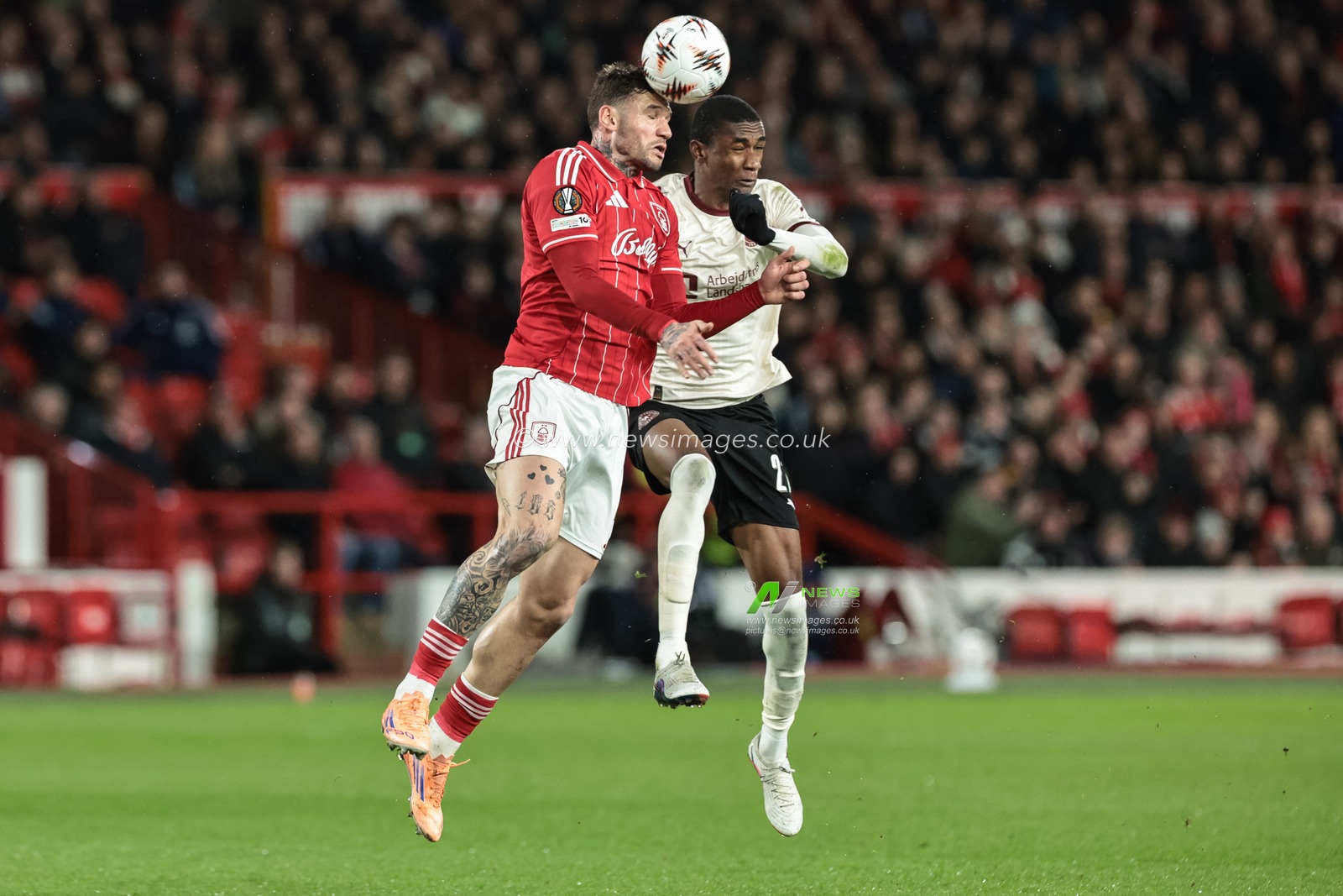 Morato of Nottingham Forest jumps up to win the high ball from Denil Castillo of FC Midtjylland during the UEFA Europa League Last 16 match Nottingham Forest vs FC Midtjylland at City Ground, Nottingham, United Kingdom on 12 March 2026

(Photo by Alfie Cosgrove/News Images)