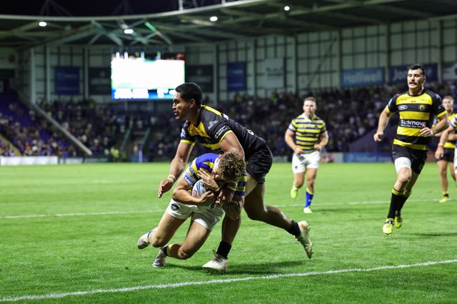 Arron Lindop of Warrington Wolves goes over for a try during the Betfred Super League round 23 match Warrington Wolves vs York Knights at The Halliwell Jones Stadium, Warrington, United Kingdom on 13 August 2026

(Photo by Mark Cosgrove/News Images)