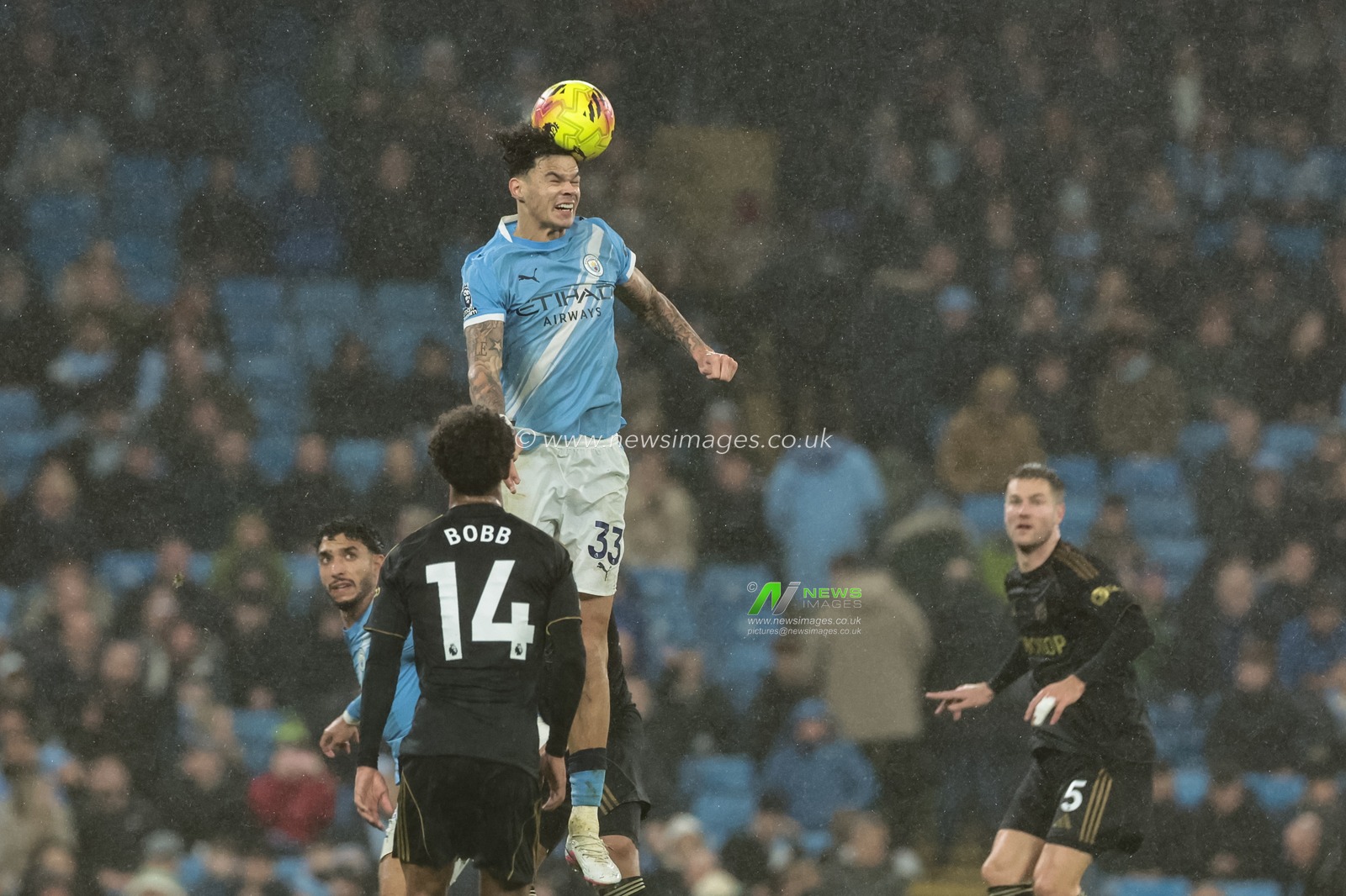 Nico O'Reilly of Manchester City jumps up to win the high ball during the Premier League match Manchester City vs Fulham at Etihad Stadium, Manchester, United Kingdom on 11 February 2026

(Photo by Mark Cosgrove/News Images)