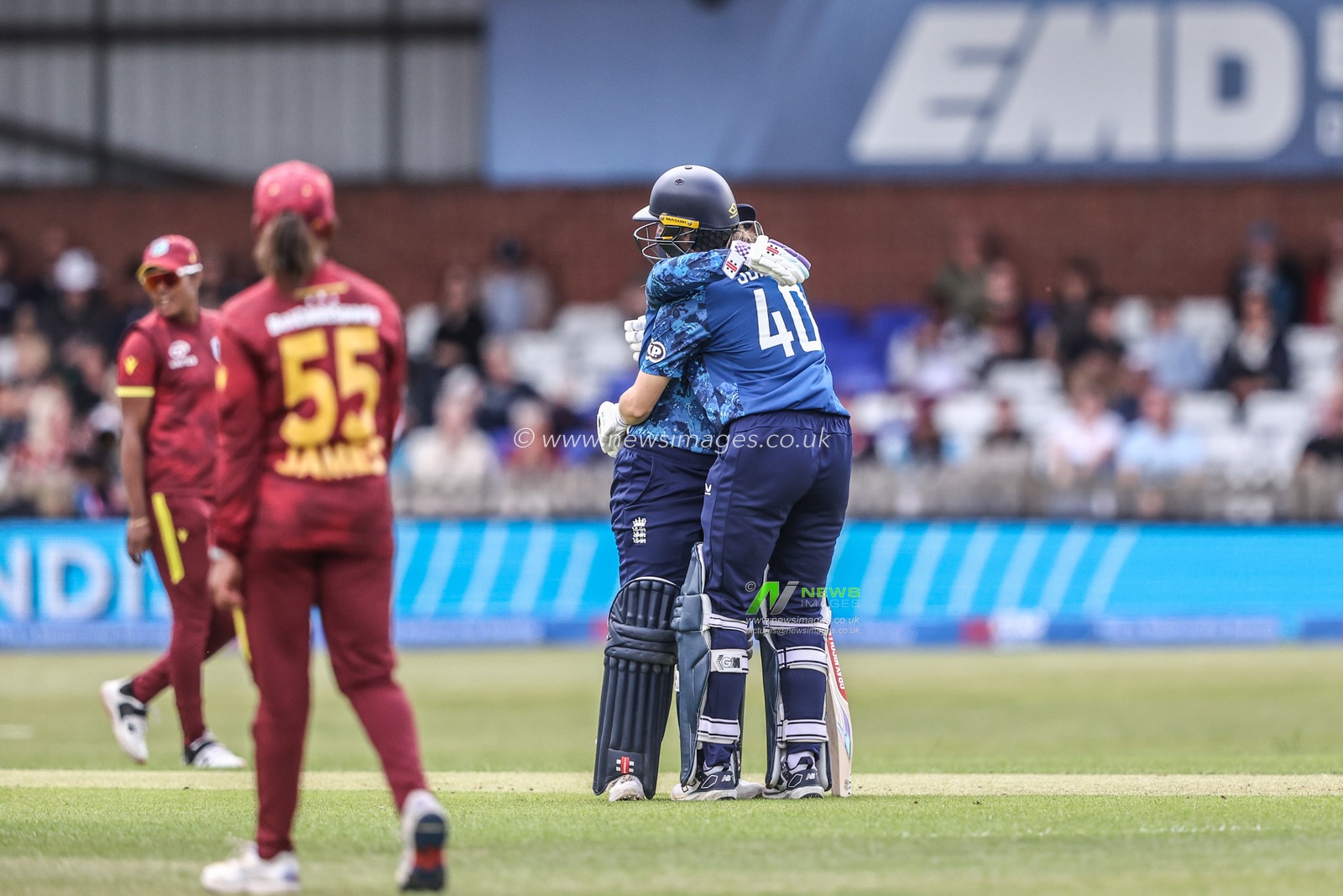 Tammy Beaumont of England and Amy Jones of England celebrate Englandâ€™s 200 without any outs during the Metro Bank One Day International match England Women vs West Indies Women at Derbyshire County Cricket Club, Derby, United Kingdom, 30th May 2025

(Photo by Alfie Cosgrove/News Images)