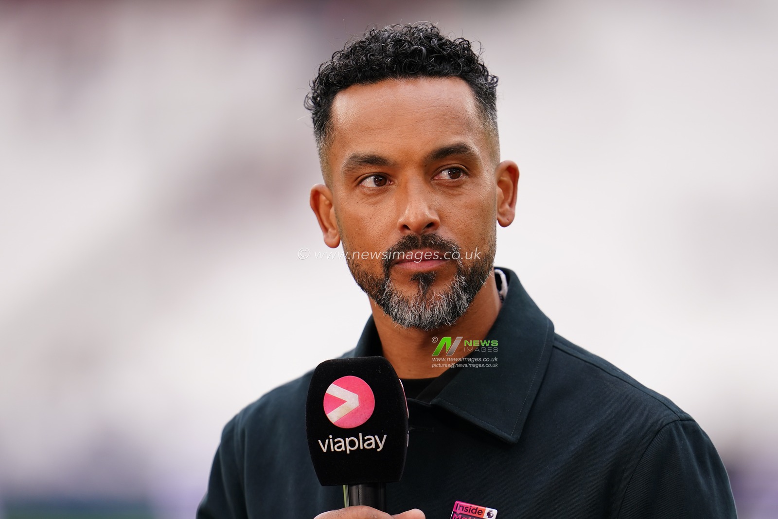 Ex player and pundit Theo Walcott ahead of kick off during the Premier League match West Ham United vs Arsenal at London Stadium, London, United Kingdom on 10 May 2026

(Photo by Harvey Murphy/News Images)