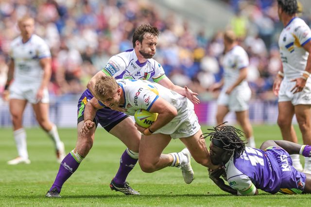 Cooper Jenkins of Leeds Rhinos is tackled by Eribe Doro of Bradford Bulls during the Betfred Super League Magic Weekend match Leeds Rhinos vs Bradford Bulls at Hill Dickinson Stadium, Liverpool, United Kingdom on 05 July 2026

(Photo by Mark Cosgrove/News Images)