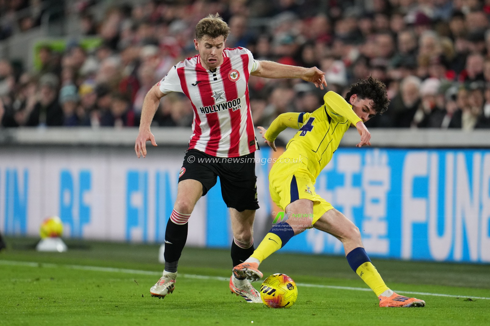 Nathan Collins of Brentford wins ball off Archie Gray of Tottenham Hotspur during the Premier League match Brentford vs Tottenham Hotspur at The Gtech Community Stadium, London, United Kingdom, 1st January 2026

(Photo by Harvey Murphy/News Images)

*** GER AUT SUI OUT ***