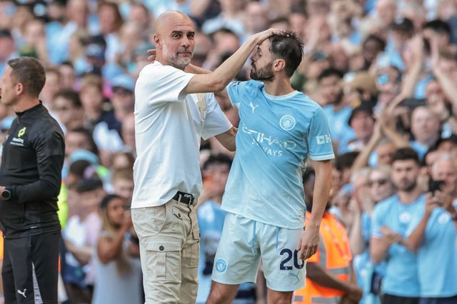 Pep Guardiola manager of Manchester City embraces Bernardo Silva of Manchester City after he’s substituted off during the Premier League match Manchester City vs Aston Villa at Etihad Stadium, Manchester, United Kingdom on 24 May 2026

(Photo by Mark Cosgrove/News Images)