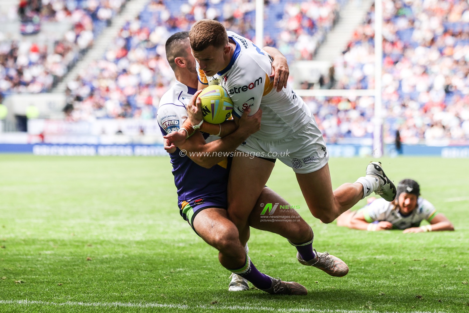 Ash Handley of Leeds Rhinos goes over for a try during the Betfred Super League Magic Weekend match Leeds Rhinos vs Bradford Bulls at Hill Dickinson Stadium, Liverpool, United Kingdom on 05 July 2026

(Photo by Alfie Cosgrove/News Images)