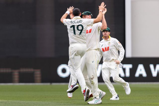 Scott Boland of Australia is congratulated by his team mates after taking a wicket during the NRMA Insurance Ashes First Test Day 2 Australia vs England at Optus Stadium, Perth, Australia, 22nd November 2025

(Photo by Santanu Banik/News Images)

*** GER AUT SUI OUT ***