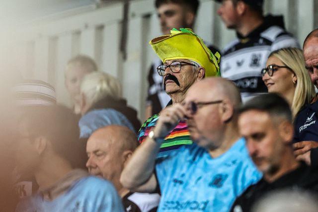 Hull FC fans in the away stand during the Betfred Super League round 23 match St Helens vs Hull FC at Totally Wicked Stadium, St Helens, United Kingdom, 22nd August 2025

(Photo by Alfie Cosgrove/News Images)