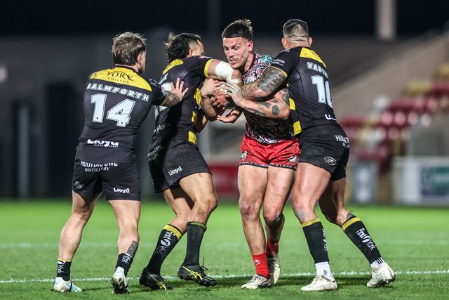 Owen Trout of Leigh Leopards is tackled by Paul Vaughan of York Knights during the Betfred Super League round 8 match York Knights vs Leigh Leopards at LNER Community Stadium, York, United Kingdom on 17 April 2026

(Photo by Alfie Cosgrove/News Images)