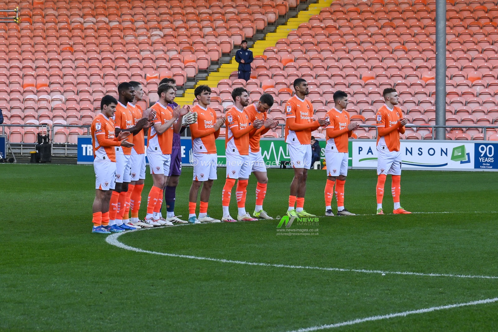 The blackpool team during the minutes applauds in remembrance for the lost Blackpool fans during the last year during the Sky Bet League 1 match Blackpool vs Shrewsbury Town at Bloomfield Road, Blackpool, United Kingdom, 1st January 2025

(Photo by Craig Thomas/News Images)