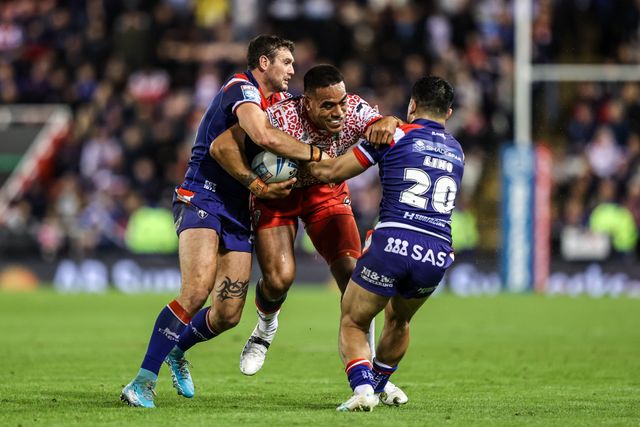 Joe Ofahengaue of Leigh Leapords is tackled by Jay Pitts of Wakefield Trinity and Mason Lino of Wakefield Trinity during the Betfred Super League play-off Eliminator 1 match Leigh Leopards vs Wakefield Trinity at Progress With Unity Stadium, Leigh, United Kingdom, 26th September 2025

(Photo by Alfie Cosgrove/News Images)