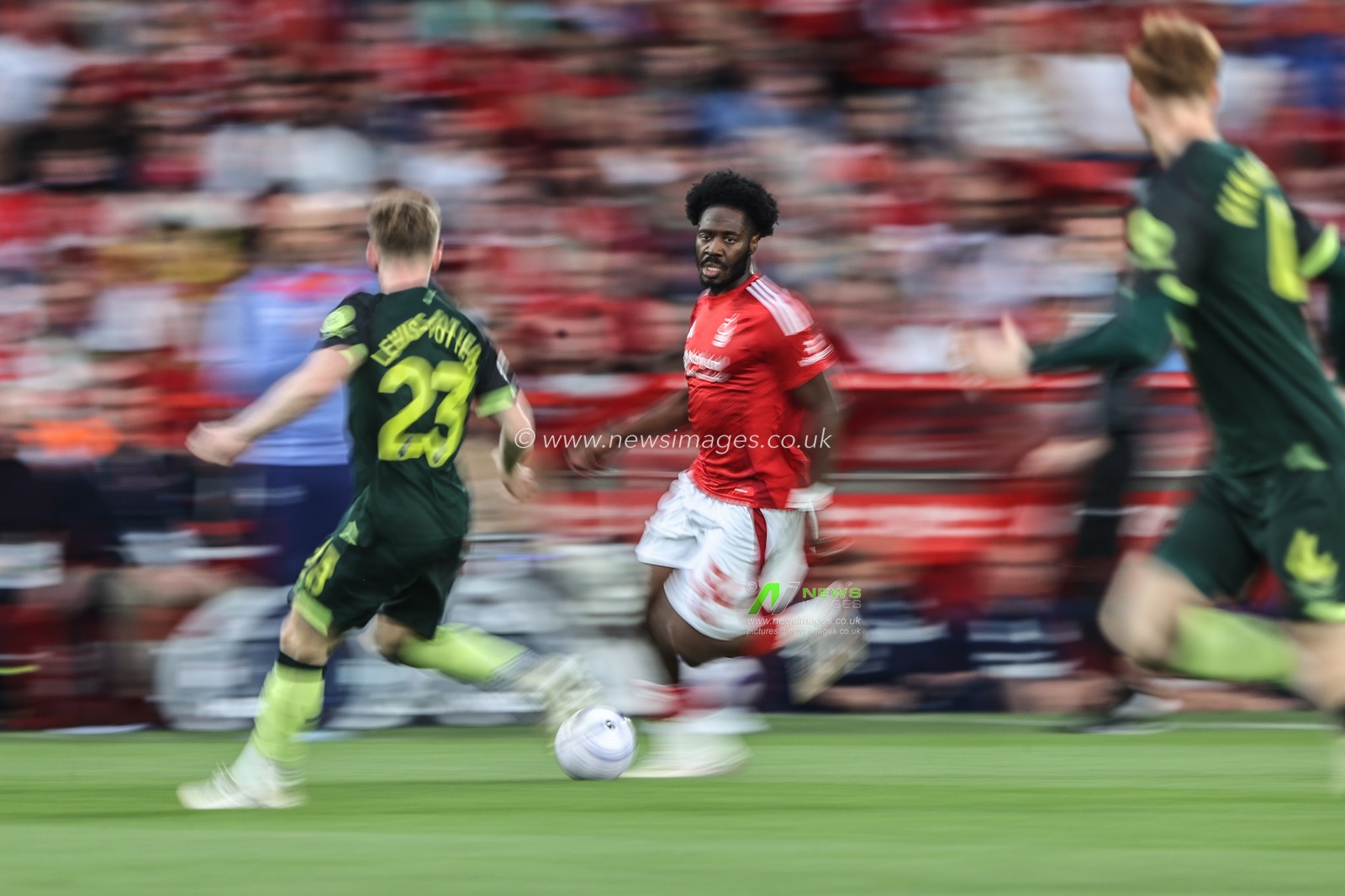 Ola Aina of Nottingham Forest breaks with the ball during the Premier League match Nottingham Forest vs Brentford at City Ground, Nottingham, United Kingdom, 30th April 2025

(Photo by Alfie Cosgrove/News Images)
