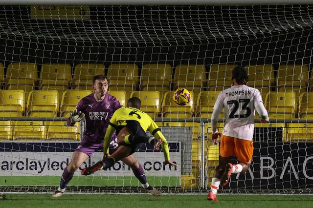 Warren Burrell of Harrogate Town scores to make it 2-0 during the Bristol Street Motors Trophy match Harrogate Town vs Blackpool at Wetherby Road, Harrogate, United Kingdom, 12th November 2024

(Photo by Alfie Cosgrove/News Images)