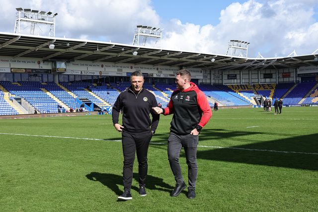 Sam Burgess head coach of Warrington Wolves and Scott Taylor head coach of Goole Vikings speak as the walk out on the pitch during the Betfred Challenge Cup round 4 match Goole Vikings vs Warrington Wolves at The Halliwell Jones Stadium, Warrington, United Kingdom on 14 March 2026

(Photo by Mark Cosgrove/News Images)