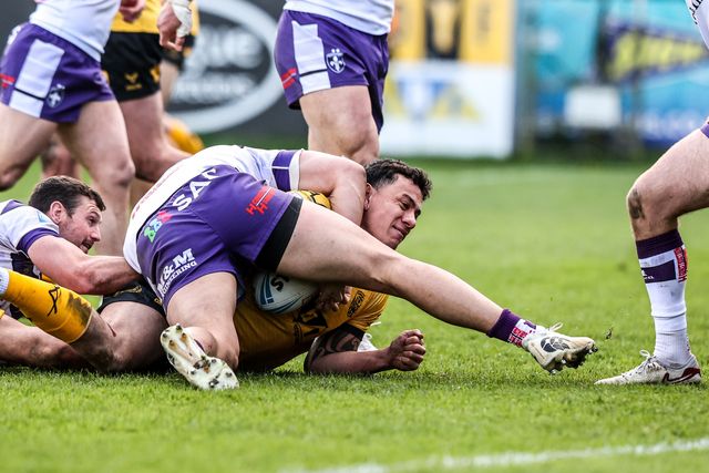 Daejarn Asi of Castleford Tigers is tackled by Isaiah Vagana of Wakefield Trinity during the Betfred Super League round 7 match Castleford Tigers vs Wakefield Trinity at OneBore Stadium, Castleford, Untied Kingdom on 05 April 2026

(Photo by Alfie Cosgrove/News Images)