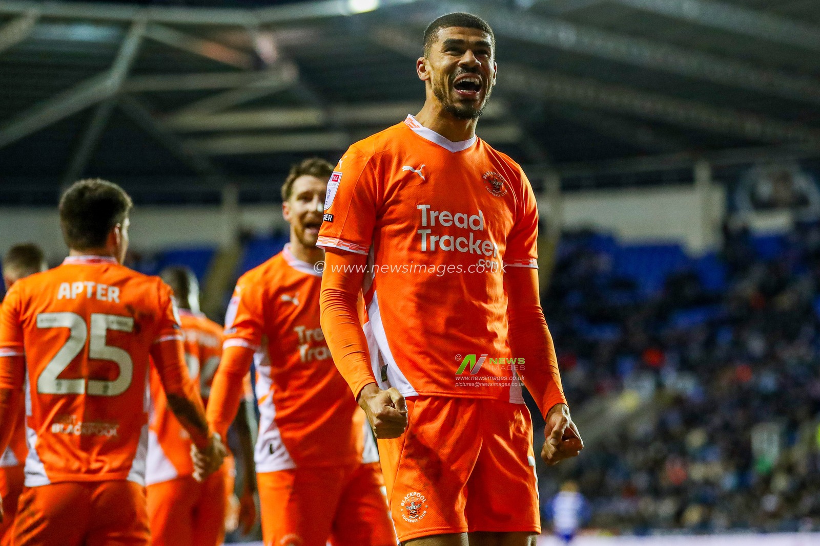 Ashley Fletcher of Blackpool celebrates his goal with teammates to make it 0-3 during the Sky Bet League 1 match Reading vs Blackpool at Select Car Leasing Stadium, Reading, United Kingdom, 14th December 2024

(Photo by Izzy Poles/News Images)