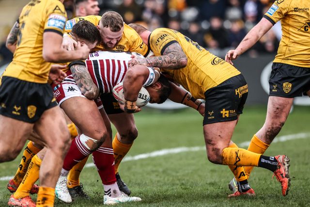 Patrick Mago of Wigan Warriors is tackled during the Betfred Super League round 1 match Castleford Tigers vs Wigan Warriors at OneBore Stadium, Castleford, Untied Kingdom on 15 February 2026

(Photo by Alfie Cosgrove/News Images)