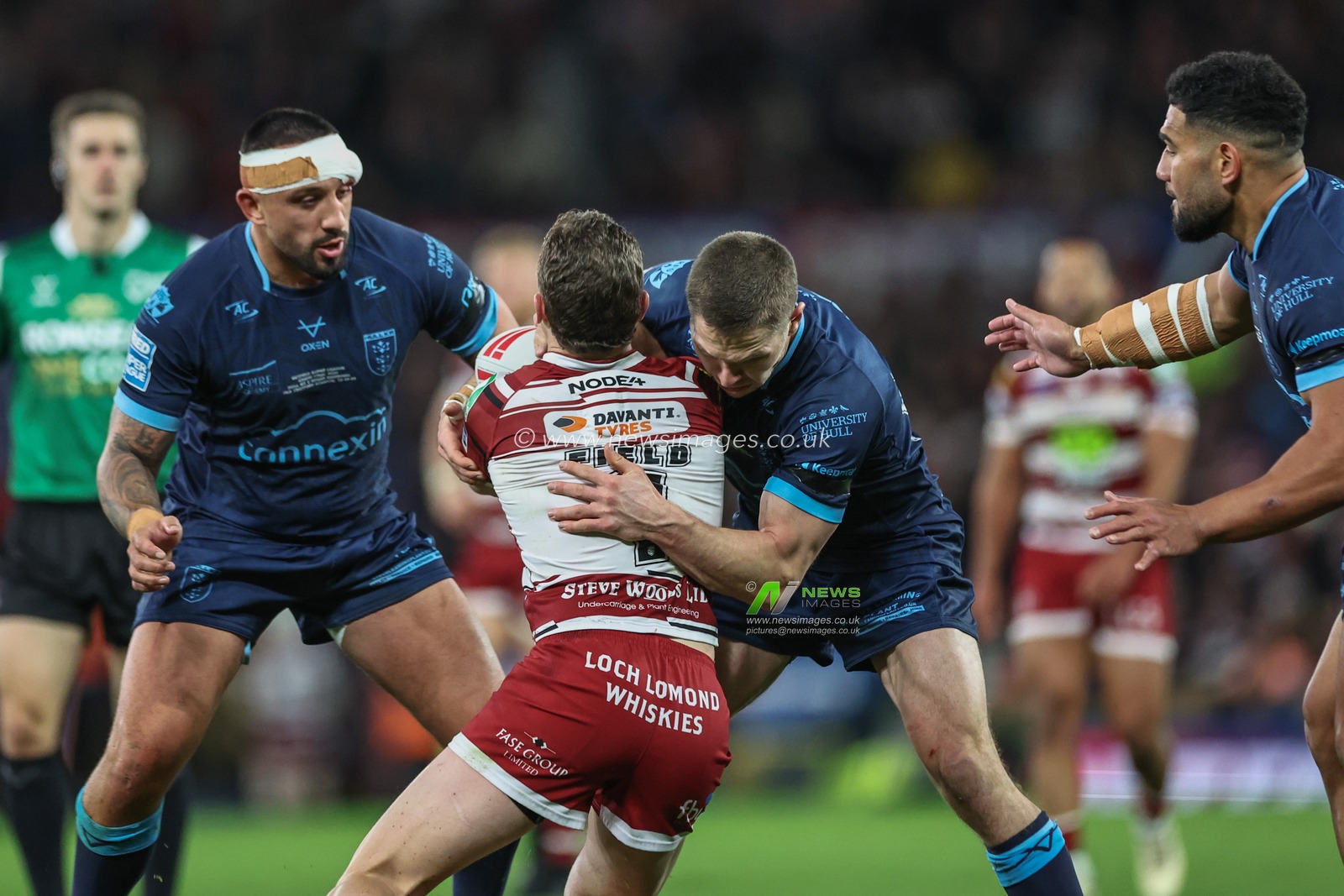 Matt Parcell of Hull KR tackles Jai Field of Wigan Warriors during the Betfred Super League Grand Final match Wigan Warriors vs Hull KR at Old Trafford, Manchester, United Kingdom, 12th October 2024

(Photo by Mark Cosgrove/News Images)