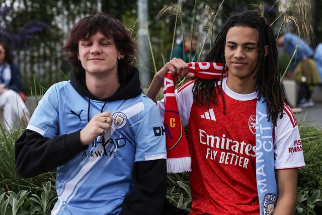 Manchester City and Arsenal fans who are friends  are both attending the game during the Premier League match Manchester City vs Arsenal at Etihad Stadium, Manchester, United Kingdom on 19 April 2026

(Photo by Mark Cosgrove/News Images)
