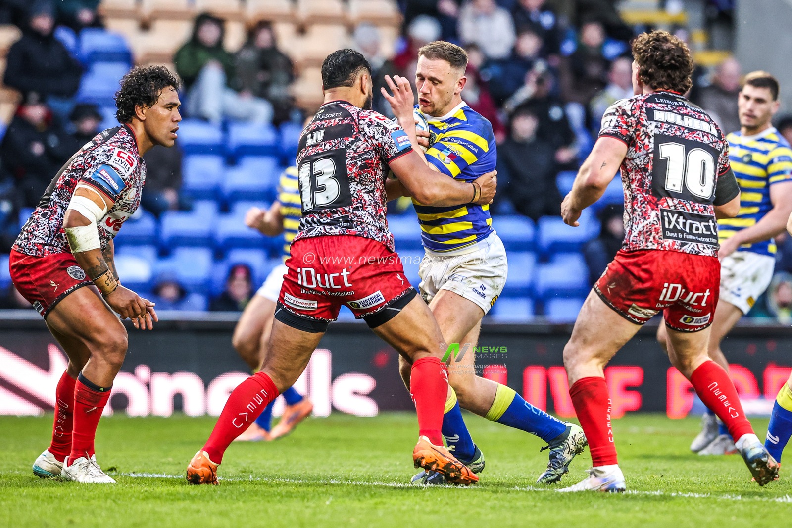 Ben Currie of Warrington Wolves is tackled by Isaac Liu of Leigh Leopards during the Betfred Challenge Cup Quarter Final match Warrington Wolves vs Leigh Leopards at The Halliwell Jones Stadium, Warrington, United Kingdom on 11 April 2026

(Photo by Alfie Cosgrove/News Images)