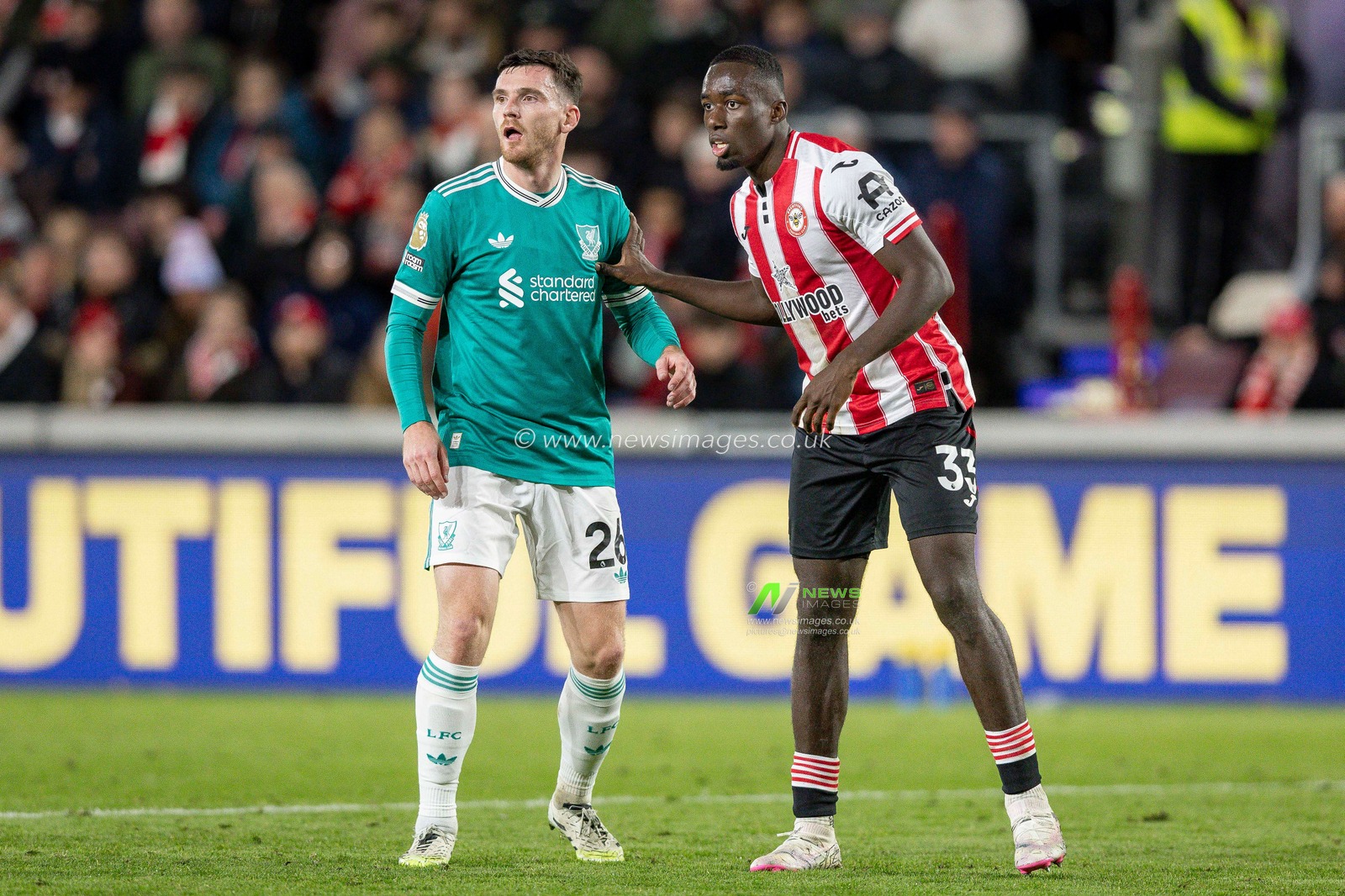 Michael Kayode of Brentford holds off Andy Robertson of Liverpool during the Premier League match Brentford vs Liverpool at The Gtech Community Stadium, London, United Kingdom, 25th October 2025

(Photo by Ian Stephen/News Images)