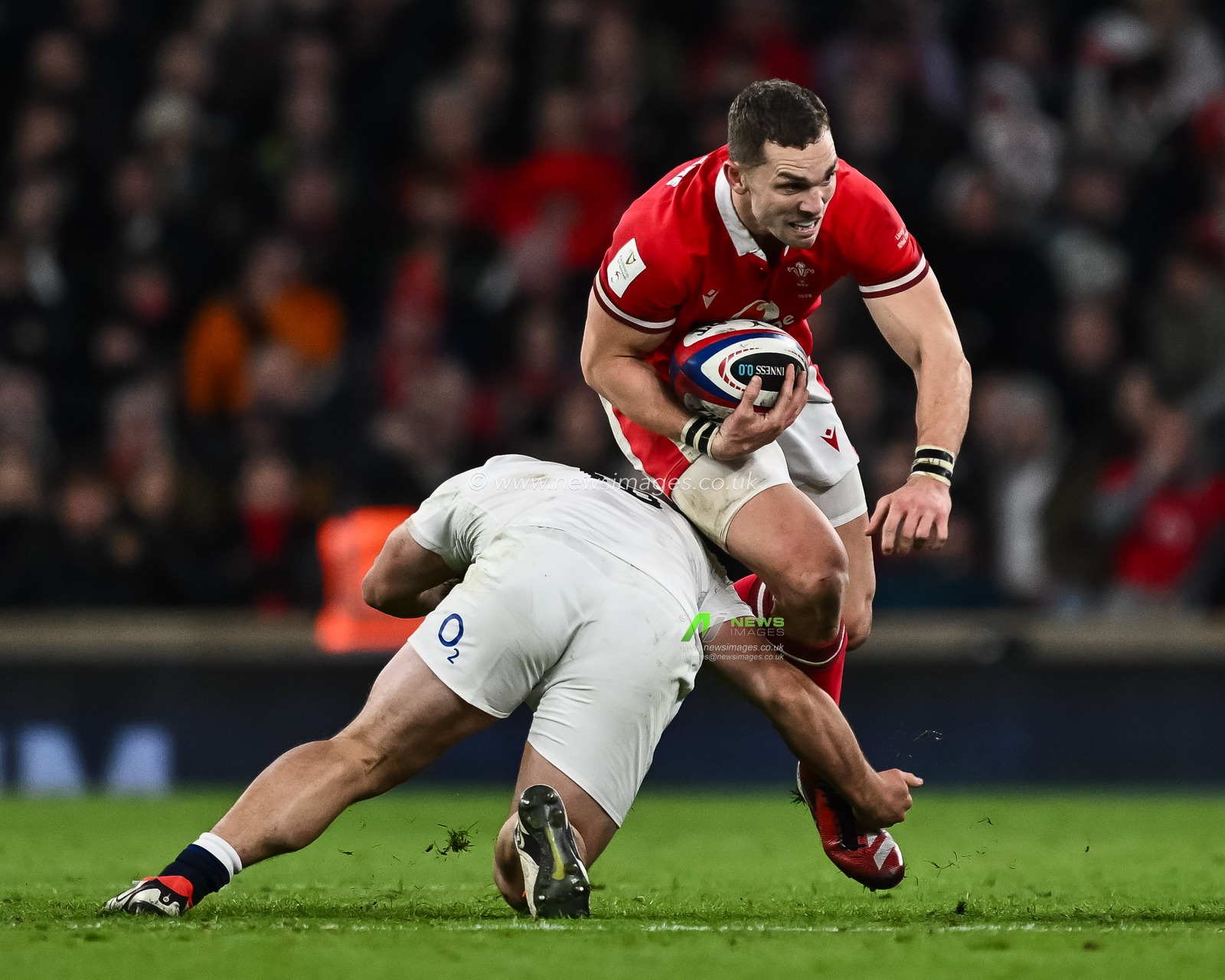 George North of Wales evades the tackle of Theo Dan of England during the 2024 Guinness 6 Nations match England vs Wales at Twickenham Stadium, Twickenham, United Kingdom, 10th February 2024

(Photo by Craig Thomas/News Images)